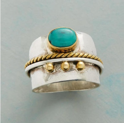 S-shaped  blue black gold horse eye ring